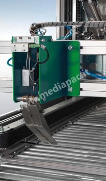 Posizionamento carello porta unità nastrante superiore con modalità da definire: rilevamento altezza scatola mediante tastatore